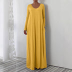 Długa sukienka z okrągłym dekoltem i długimi rękawami