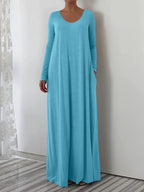 Długa sukienka z okrągłym dekoltem i długimi rękawami