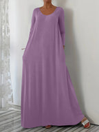 Długa sukienka z okrągłym dekoltem i długimi rękawami